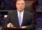 Durbin Blasts Fee He Caused